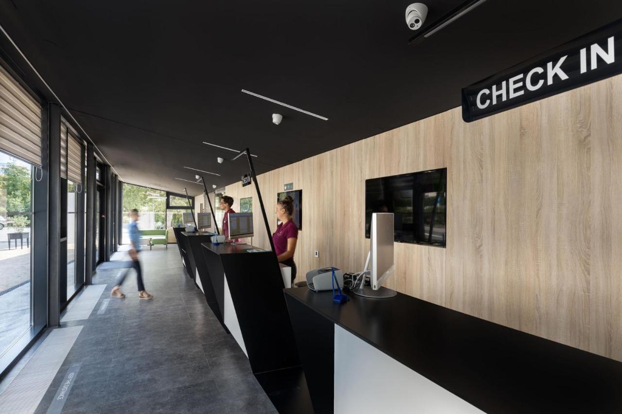 Aminess Style Glamping Villas & Holiday Homes Atea Njivice Exterior photo Check-in at the airport